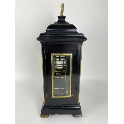 16 - A George III ebonised bracket clock having a bell top case with gilded highlights, the silvered dial... 