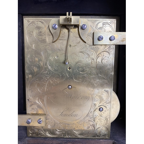 16 - A George III ebonised bracket clock having a bell top case with gilded highlights, the silvered dial... 