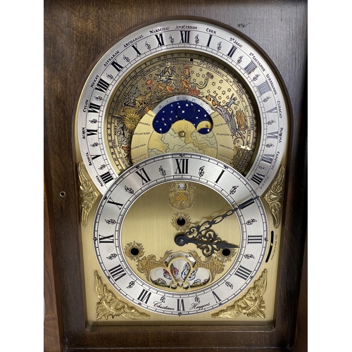 17 - A modern reproduction annual calendar and zodiac indication bracket clock, signed Christiaan Huygens... 