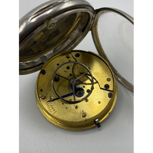 53 - A Victorian silver cased open faced lever pocket watch having a silvered dial with machine turned fl... 