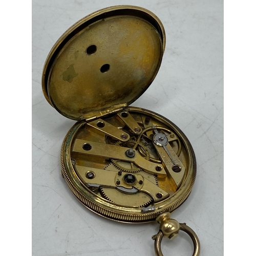 57 - A Late 19th century 18ct gold open faced fob watch having a machine floral decorated centre and Roma... 
