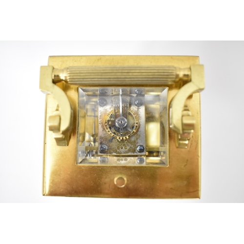 2 - A late 19th/early 20th century brass cased repeater carriage clock having a white enamel dial with R... 