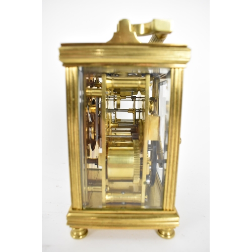 2 - A late 19th/early 20th century brass cased repeater carriage clock having a white enamel dial with R... 