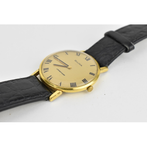 23 - A gents Bulova Longchamp gold plated manual wind 17 jewel movement wristwatch having Roman numerals ... 