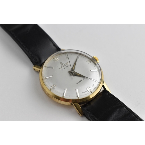 29 - A 1960's gents Lanco manual wind 17 jewels Incabloc 9ct gold wristwatch having a silvered dial with ... 