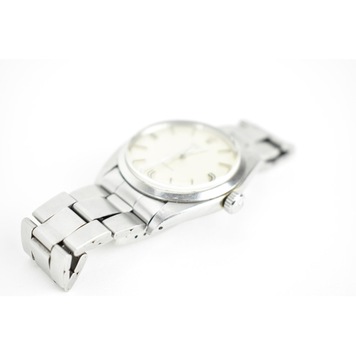 50 - A 1971 Rolex Oyster Precision stainless steel manual wind wristwatch having silvered dial with baton... 