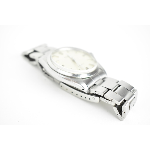 50 - A 1971 Rolex Oyster Precision stainless steel manual wind wristwatch having silvered dial with baton... 