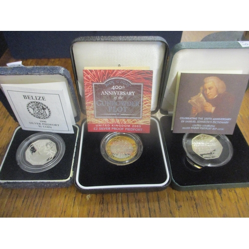 28 - This lot has been withdrawn

A 1990 Belize silver piedfort $1 coin, a 2005 Gunpowder plot £2 silver ... 