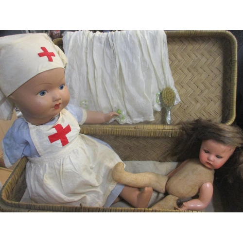 38 - A vintage British bisque doll in nurses uniform A/F together with a German H.J.L doll with bisque he... 