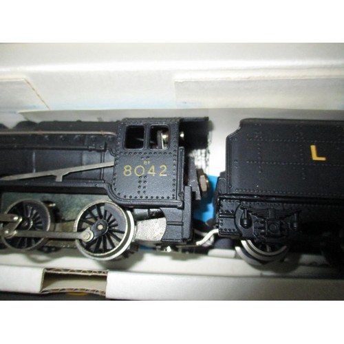 4 - A Wrenn 00 gauge boxed locomotive and an Airfix locomotive in incorrect box, one is a Freight 2-8-0 ... 