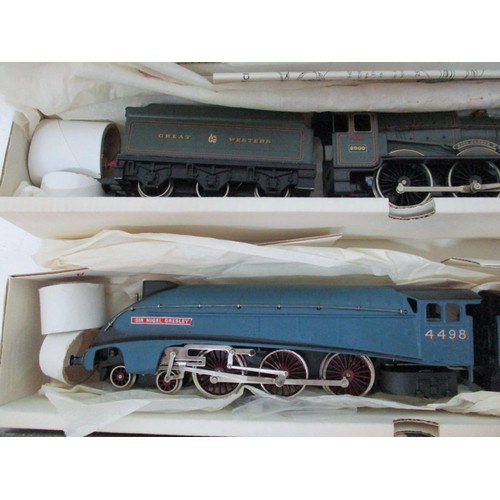 5 - A Wrenn 00 gauge boxed locomotive and a LIMA one, one being a Coronation LMS green King George V (in... 