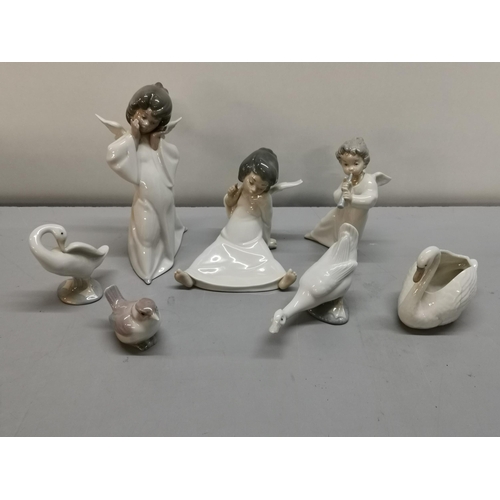 53 - Lladro to include three angels, a Robin and a Goose, together with a Nao Swan and Goose 
Location: 6... 