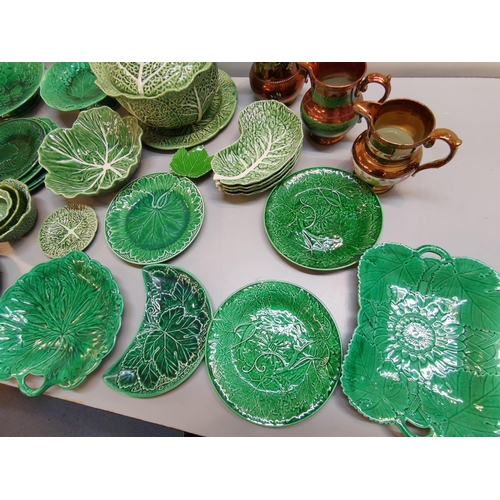60 - Cabbage ware to include six Wedgwood examples together with three copper lustre jugs
Location: 5:4