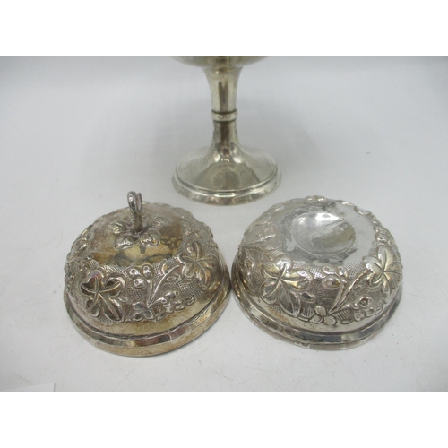 9 - Two items of silver and white metal comprising a silver sweetmeat dish 110.8g, and a circular floral... 