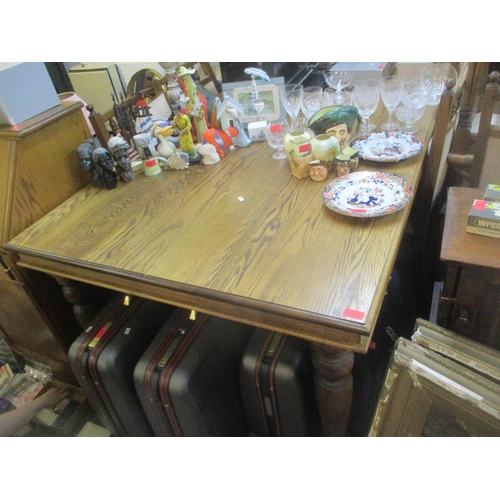 7 - An oak dining table together with a set of eight chairs 
Location: RAF