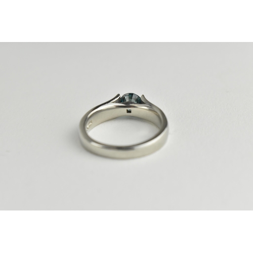 5 - A solitaire aqua coloured diamond ring approx 0.8ct in a platinum curved setting, size
