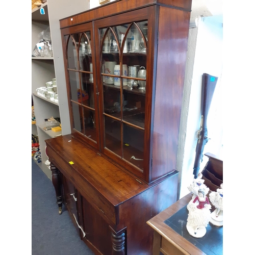 11 - A Regency mahogany bookcase with twin glazed doors 175cm x 109cm x 51cm 
Location: RWB