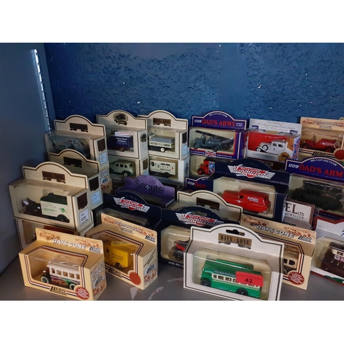 42 - A collection of boxed die cast vehicles, mainly vintage vans and buses to include Lledo, Days Gone, ... 