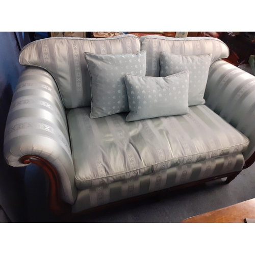57 - A Medallion blue striped two seater sofa and matching three seater sofa both with scrolled show wood... 