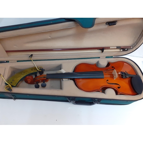 8 - An Antoni Lark violin with bow in travelling case
Location: A1F