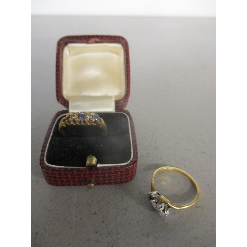 13 - Two 18ct gold rings, each with a stone missing 5.85g 
Location: Cab