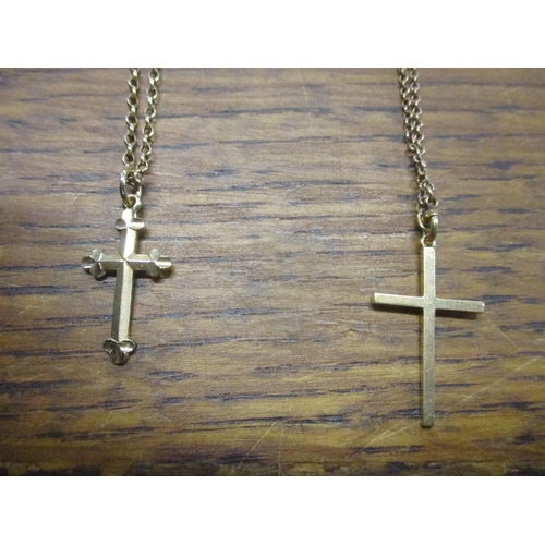 14 - Two 9ct gold cross pendants and necklaces 7.5g Location: Cab