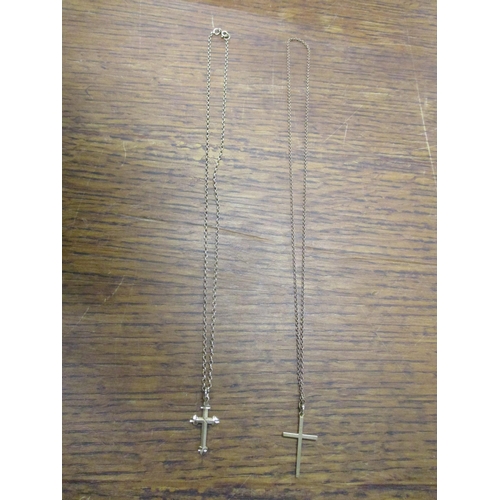 14 - Two 9ct gold cross pendants and necklaces 7.5g Location: Cab