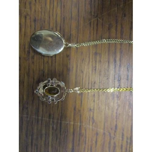 16 - An Art Nouveau style 9ct gold pendant set with a yellow faceted cut stone 3.3g, and a 9ct gold neckl... 