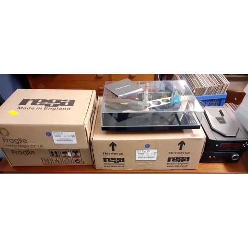 18 - A nearly new boxed Apollo Rega music system to include CD player and turntable (photos do not reflec... 