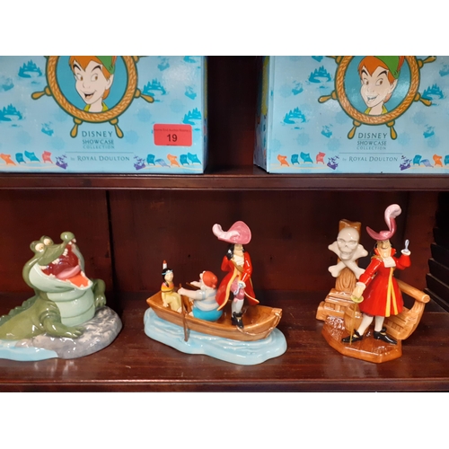 19 - Disney Showcase collectable figures by Royal Doulton, Peter Pan Collection, seven pieces with boxes ... 