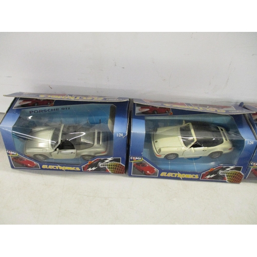 35 - Five boxed Corgi Electronics model cars, together with four boxed Weetabix model cars
Location: 8.2
