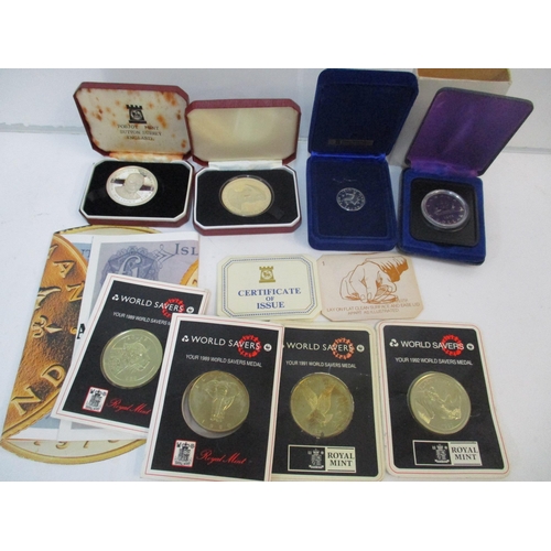 45 - Four silver coins, Canadian dollar, a Montgomery medal, and a £1 coin
Location: P