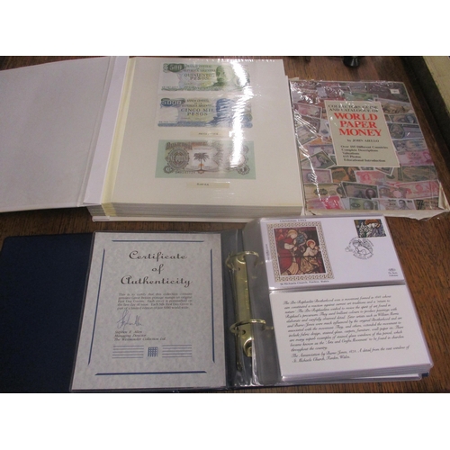55 - An album of banknotes from around the world to include Argentina, China, Holland, USA, British and I... 