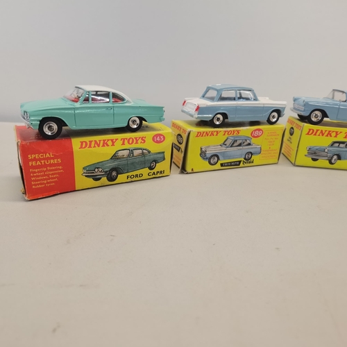 13 - A group of four boxed Dinky toys to include the Dinky 143 Ford Capri, Dinky 189 Triumph Herald, Dink... 