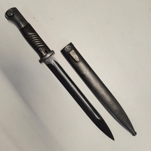 A WWII German M98 bayonet having a blackened blade marked43c... | Barnebys