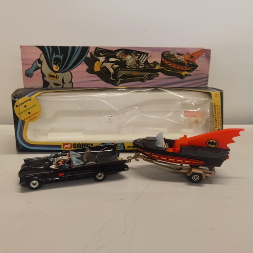 7 - A trademarked 1966 Corgi Batman Batmobile and Bat Boat boxed A/F. Condition: The box is worn and has... 