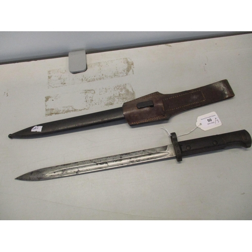 50 - A 20th century Czechoslovakian bayonet marked CSZ D to blade a E3 (rampart Lion) 46 to scabbard, tog... 