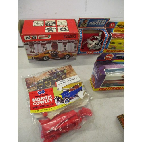 42 - Mixed boxed toys to include Ideal Evel Knievel, Postil Porsche Carrera, Dinky Merryweather 285, Supe... 