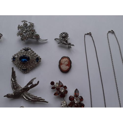 16 - A collection of vintage silver, marcasite and paste brooches to include a small cameo brooch stamped... 