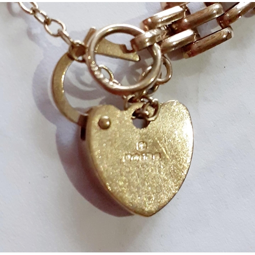 25 - A 9ct gold gate link bracelet with safety chain and heart-shaped padlock clasp, 5.42g
Location: CAB