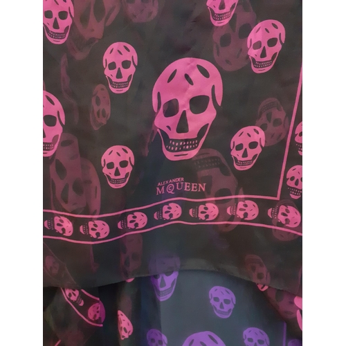 31 - Six modern sheer fashion wraps/oversized scarves, two depicting images of skulls, another one having... 