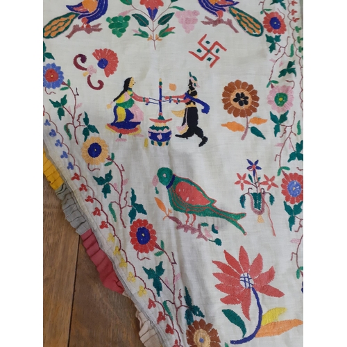 33 - A quantity of 20th Century Eastern textiles to include an Indian cotton tablecloth depicting printed... 