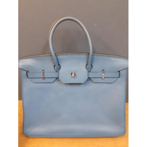 4 - Two modern handbags, one leather in mid blue in the Birkin style and the other in a white and grey s... 