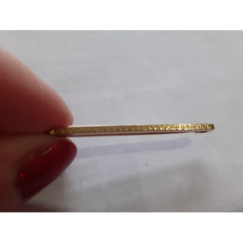 44 - A 9ct gold bar brooch, 2.32g together with a small 14ct gold and moonstone pendant, a silver and whi... 