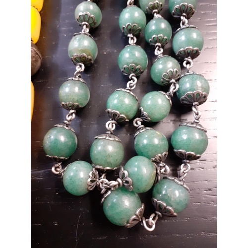 51 - Oriental costume jewellery to include a jade-coloured stone necklace
Location: RWB