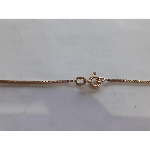 7 - An 18ct white and yellow gold box link necklace having 4 gold bead drops between 3 overlapping loops... 