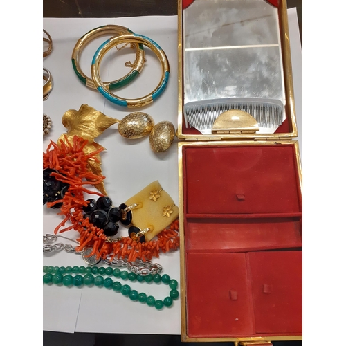 27 - Mixed costume jewellery to include a vintage red coral necklace, vintage gold tone brooches, earring... 