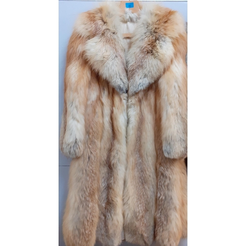 35 - A Retro Canadian red fox three quarter length coat, 40