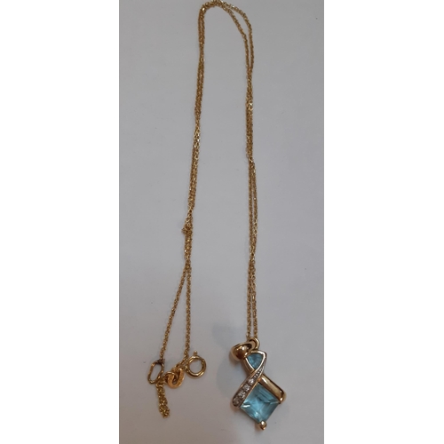 59 - A gold necklace stamped 750 together with a 9ct gold and pale blue stone pendant
Location: Cab