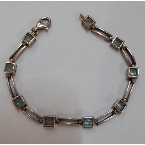 61 - Mixed modern jewellery and silver items to include silver bangles, a silver bracelet with aquamarine... 
